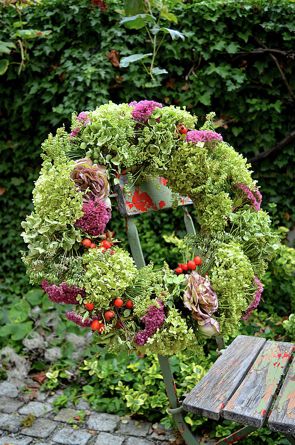 Autumn Wreath With Sedum Plant, Hydrangea, Fennel, Rose Blossoms, And Rose Hips Photograph by Christin By Hof 9