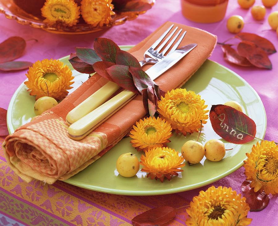 Autumnal Place-setting With Strawflowers And Leaves Photograph by Strauss, Friedrich