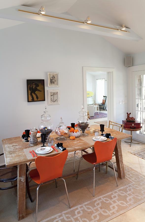 Autumnally Set Dining Table And Orange Chairs Photograph by Julia Cawley