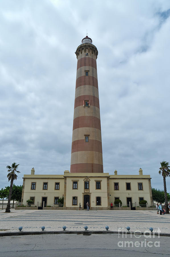 Light Photograph - Aveiro Lighthouse In Aveiro, Portugal by Angelo DeVal Light Photograph - Aveiro Lighthouse In Aveiro, Portugal by Angelo DeVal
