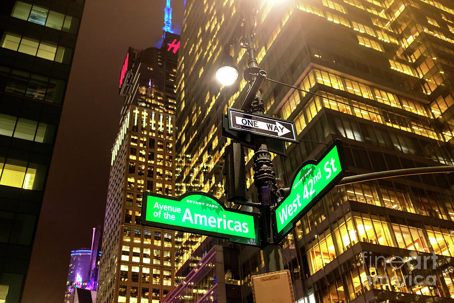 Avenue of the Americas at Night New York City Photograph by John Rizzuto