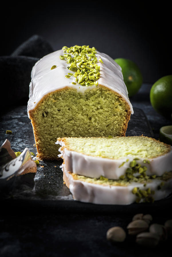 Avocado And Lime Cake With Lime Icing And Chopped Pistachios Photograph by Christian Kutschka