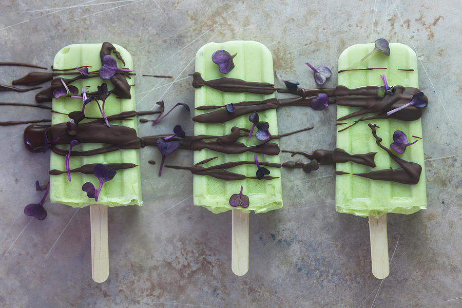 Avocado And Lime Ice Cream On A Stick With Chocolate And Radish Cress Photograph by Barbara Pheby