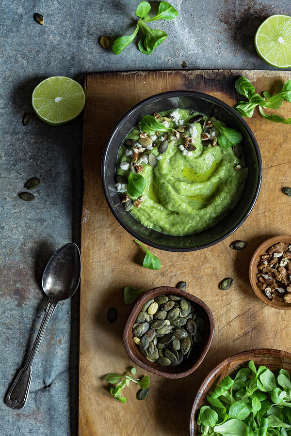 Avocado Cooler Soup With Feta Cheese, Pumplin Seeds, Walnuts And Lambs Lettuce Photograph by Mateusz Siuta
