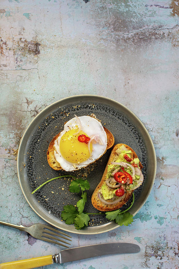 Avocado Crostini With Dukkah, Chilli And Coriander - Crostini With Fried Duck Egg Photograph by Lara Jane Thorpe