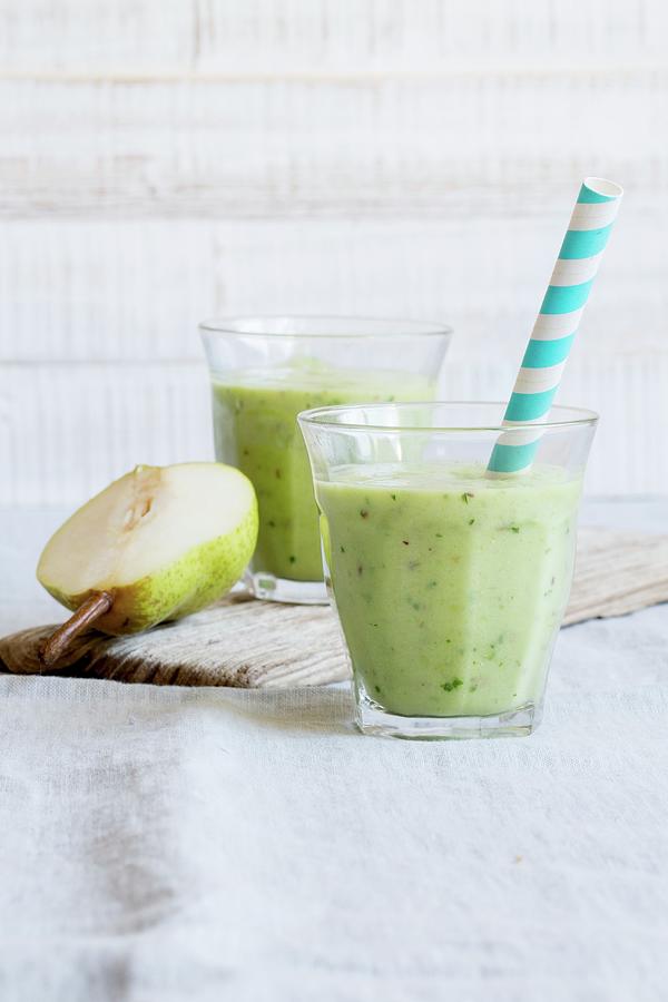 Avocado Smoothies With Pear Photograph by Claudia Timmann