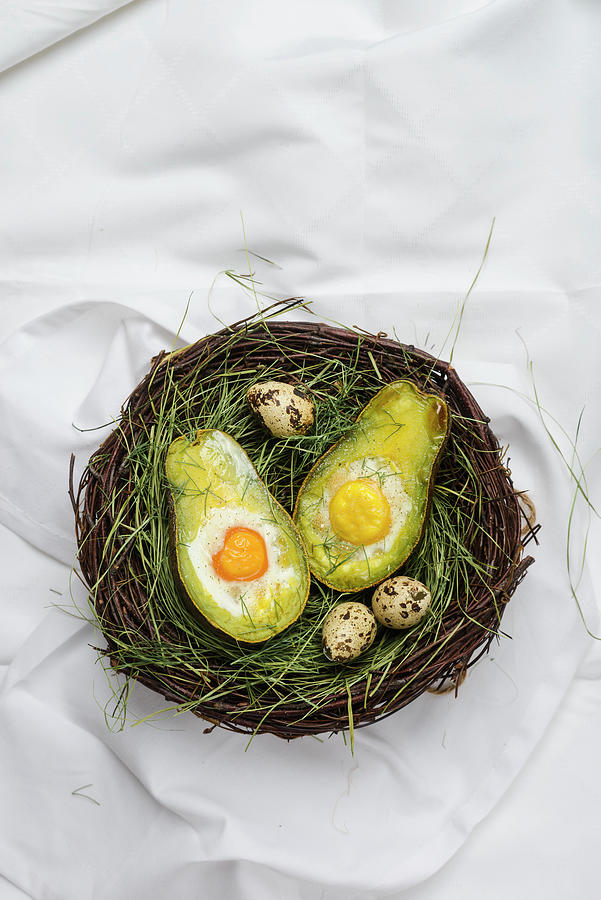 Avocado With Baked Eggs In An Easter Basket Photograph by Leah Bethmann