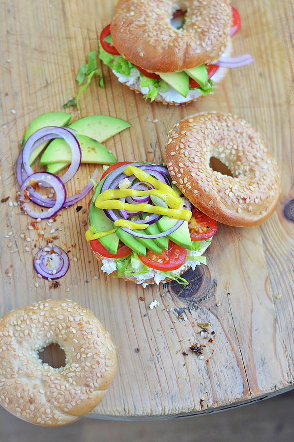 Avocado,cream Cheese And Vegetable Bagels Photograph by Keroudan