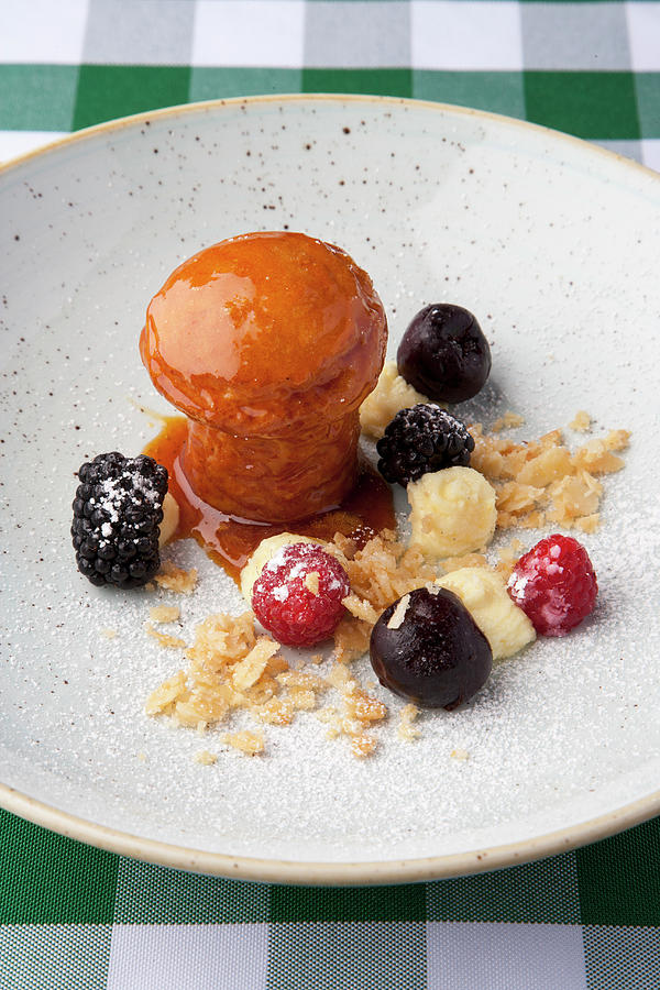 Baba Al Amaretto With Fresh Berries Photograph by Michael Wissing