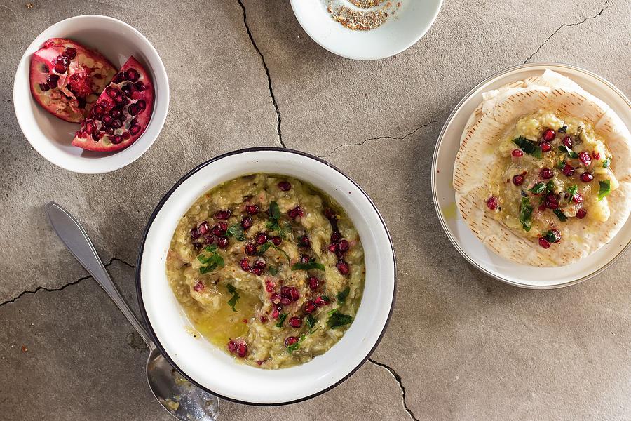 Baba Ghanoush aubergine Dip With Pomegranate Seeds, Parsley, Olive Oil And Pita Bread Photograph by Zuzanna Ploch