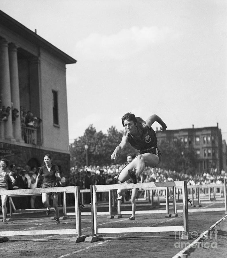 Babe Didrikson Winning The Hurdle Event Photograph by Bettmann