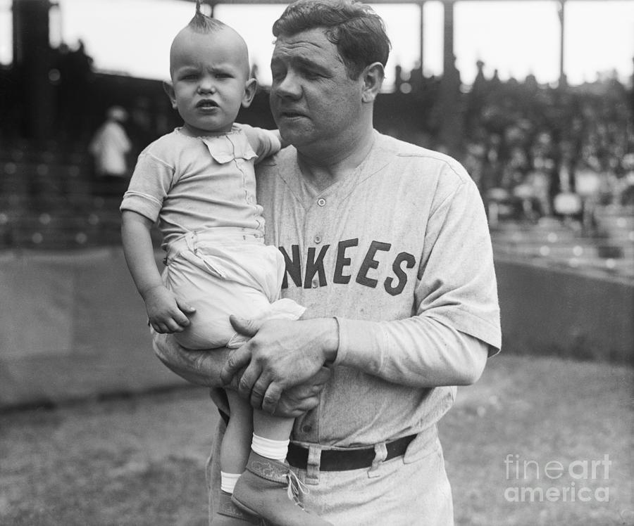 Babe Ruth Holding Infant Actor by Bettmann