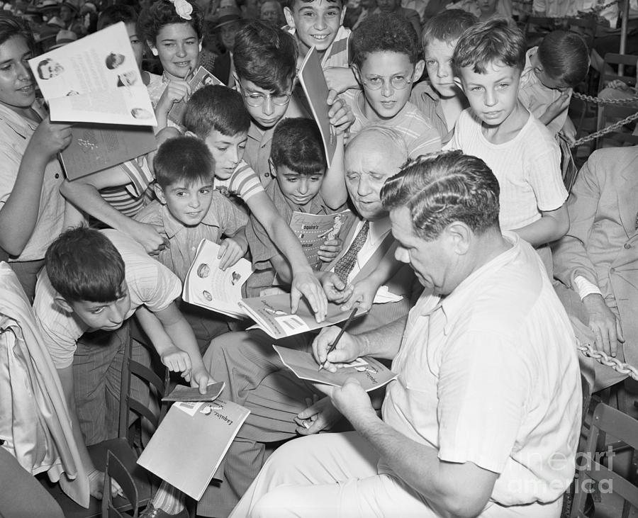 Babe Ruth Signing Autographs Photograph by Bettmann