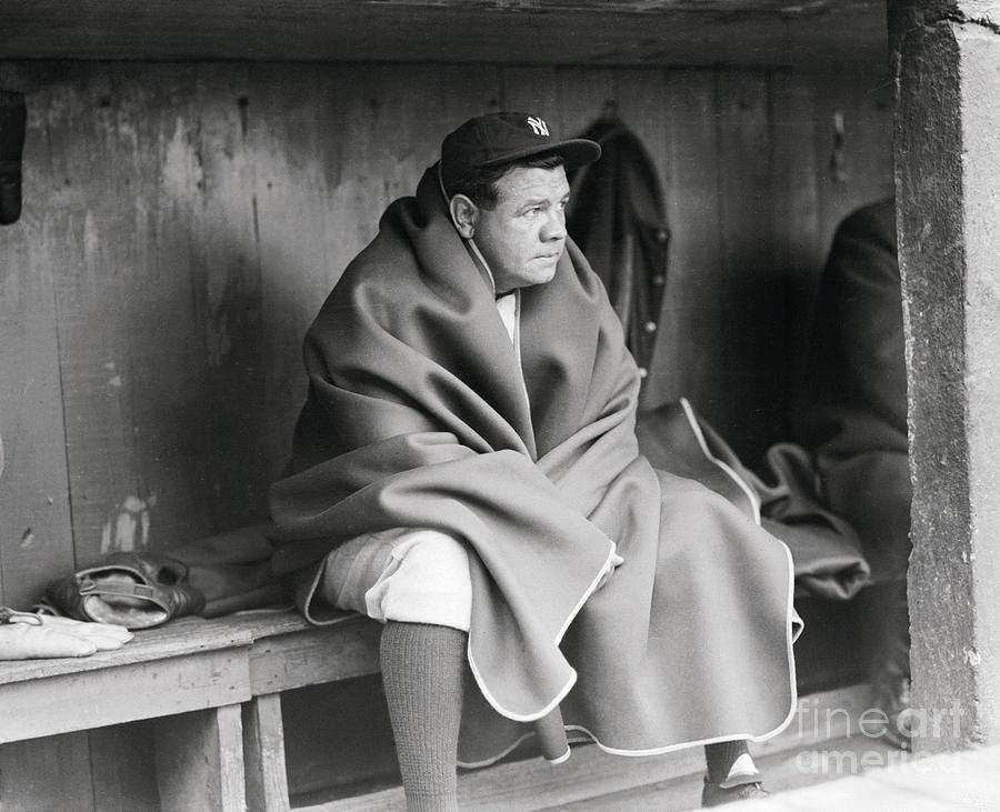 Babe Ruth Wearing Blanket In Dugout Photograph by Bettmann