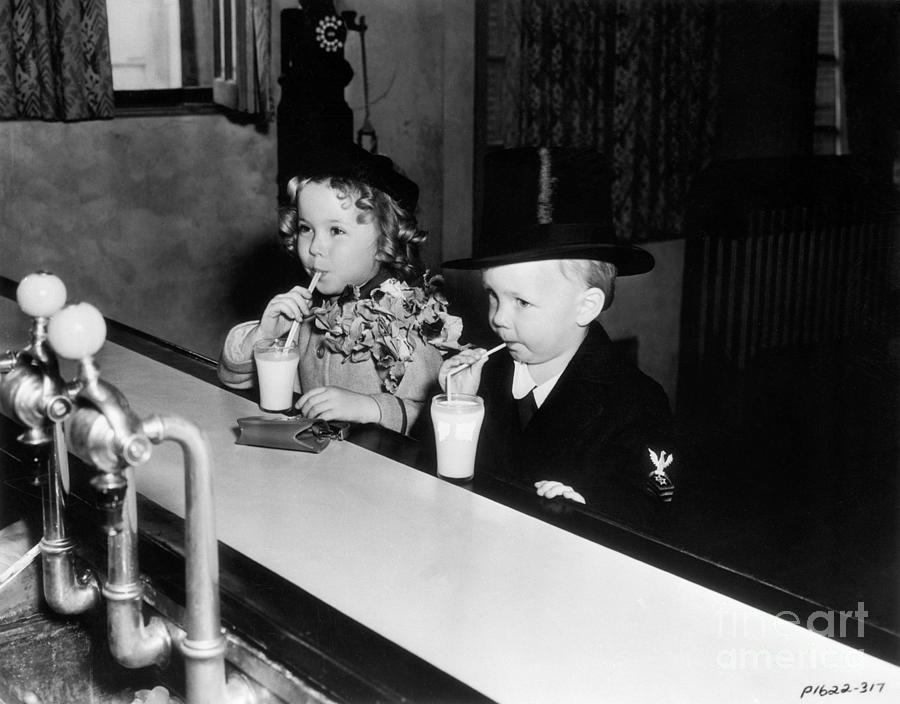 Baby Leroy And Shirely Temple Drink Milk Photograph by Bettmann