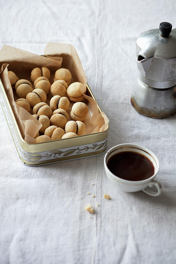 Baci Di Dama hazelnut Cookies With Chocolate Filling, Italy Photograph by Akiko Ida