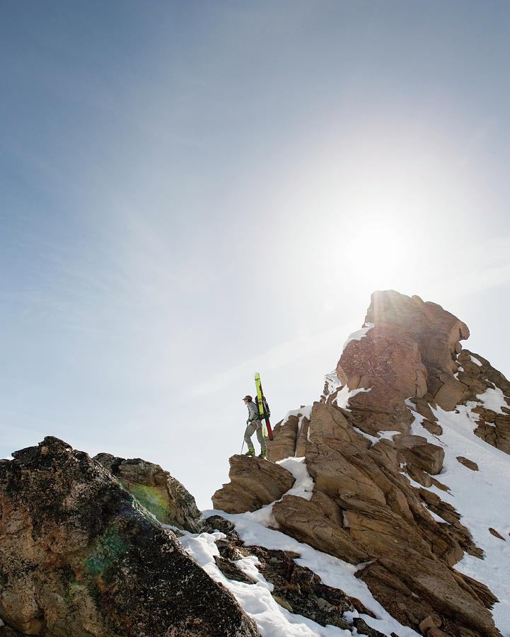 Backcountry Skier Standing On Rocky Photograph by Darryl Leniuk