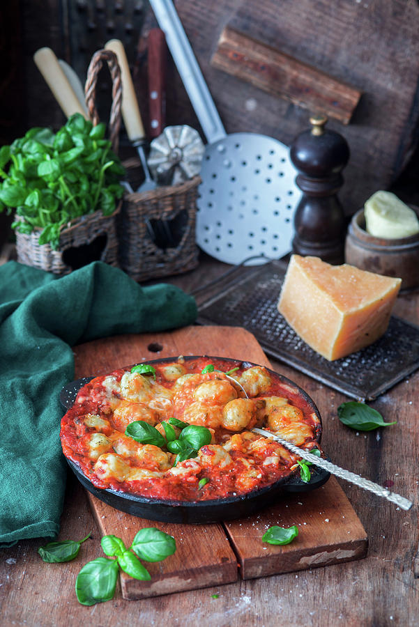 Backed Potato Gnocchi In Tomato Sauce Photograph by Irina Meliukh