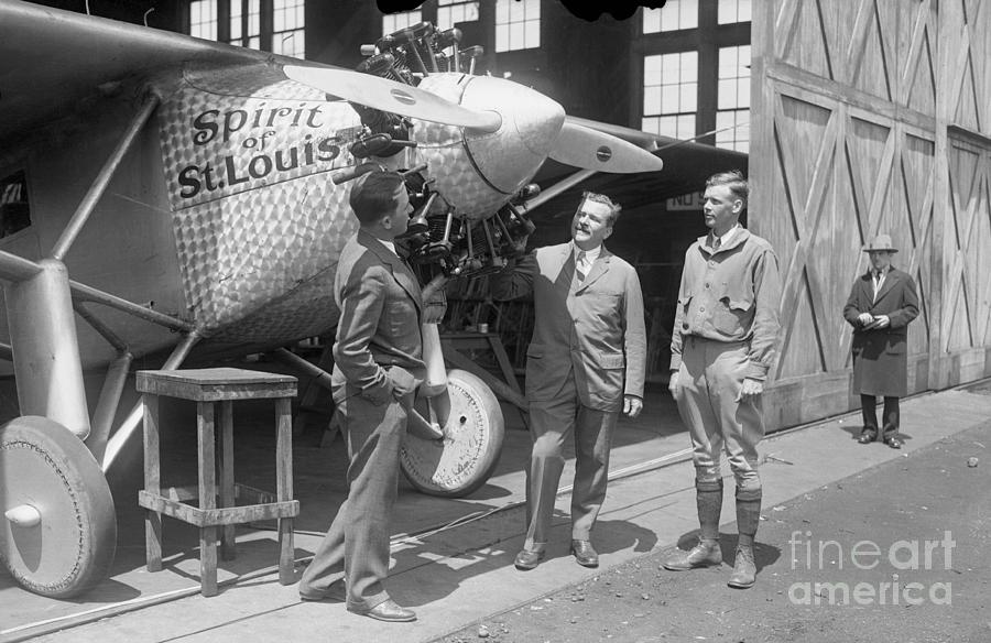 Backers Of Charles Lindbergh Examining Photograph by Bettmann