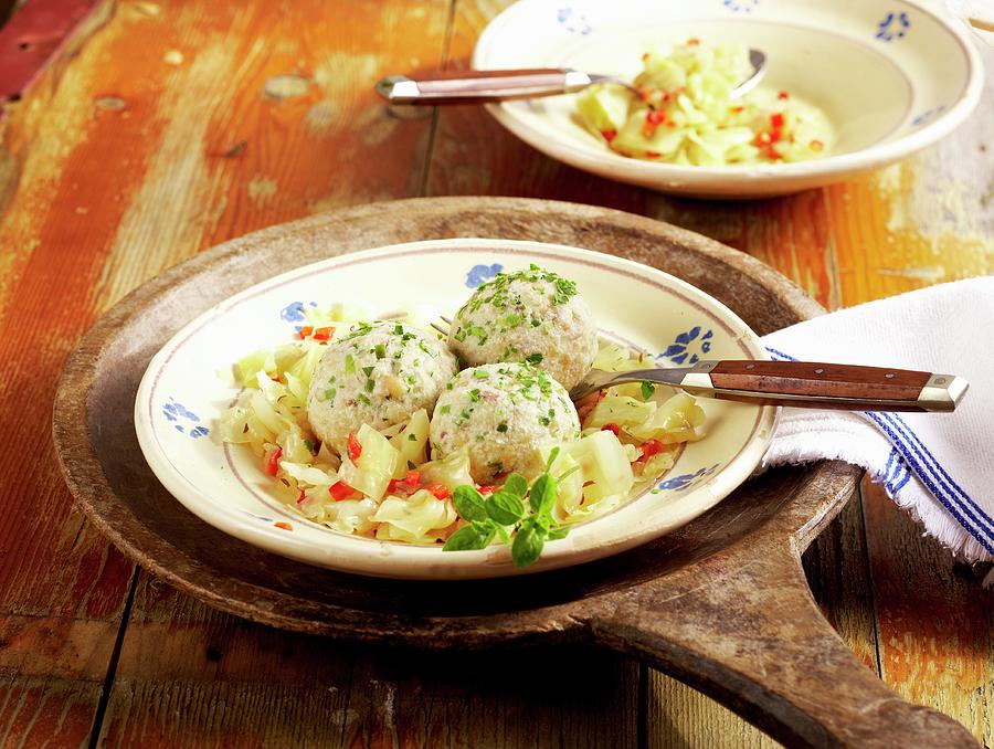 Bacon Dumplings On Cabbage Photograph by Teubner Foodfoto