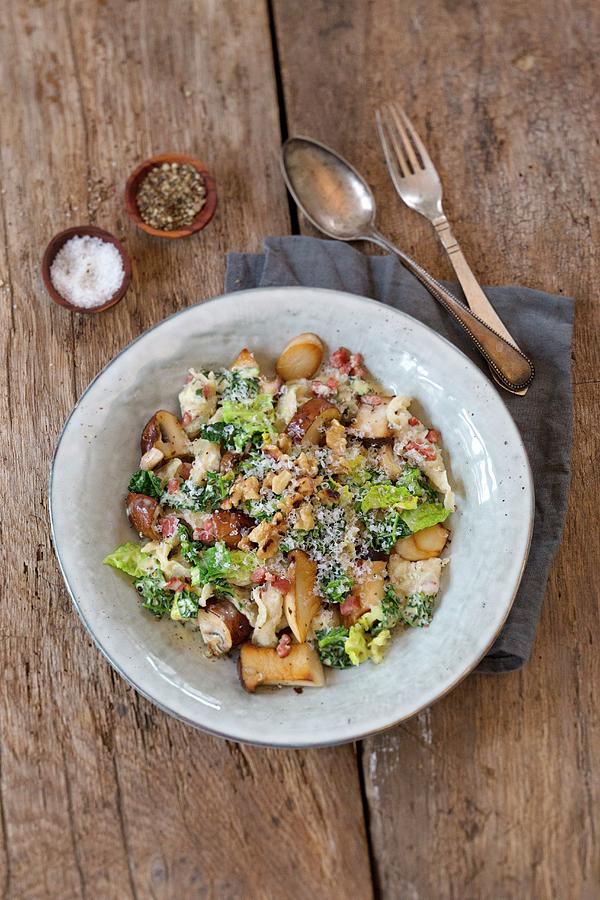 Bacon Shreds With Savoy Cabbage And Mushrooms, Sprinkled With Parmesan Photograph by Tina Engel
