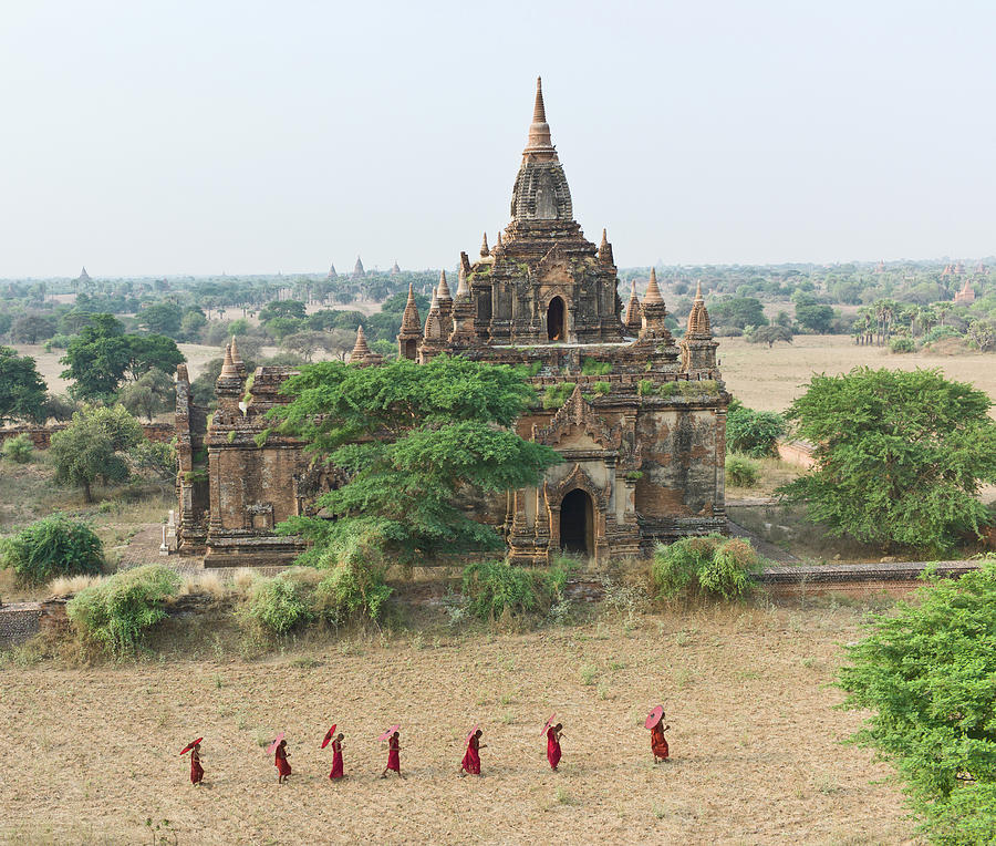 Bagan, Buddhist Monks Walking Past Photograph by Martin Puddy