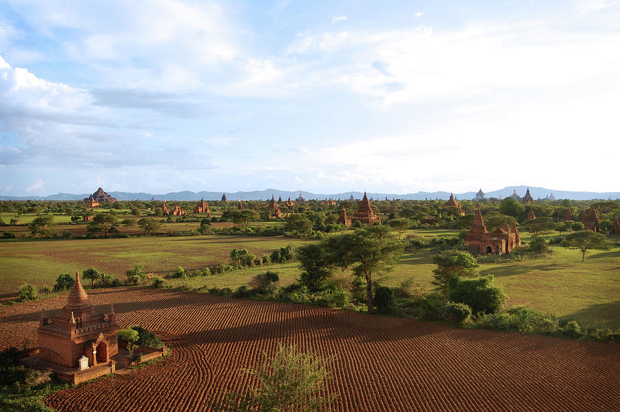 Bagan Temples And Plowed Fields W Blue Photograph by Volanthevist Bagan Temples And Plowed Fields W Blue Photograph by Volanthevist