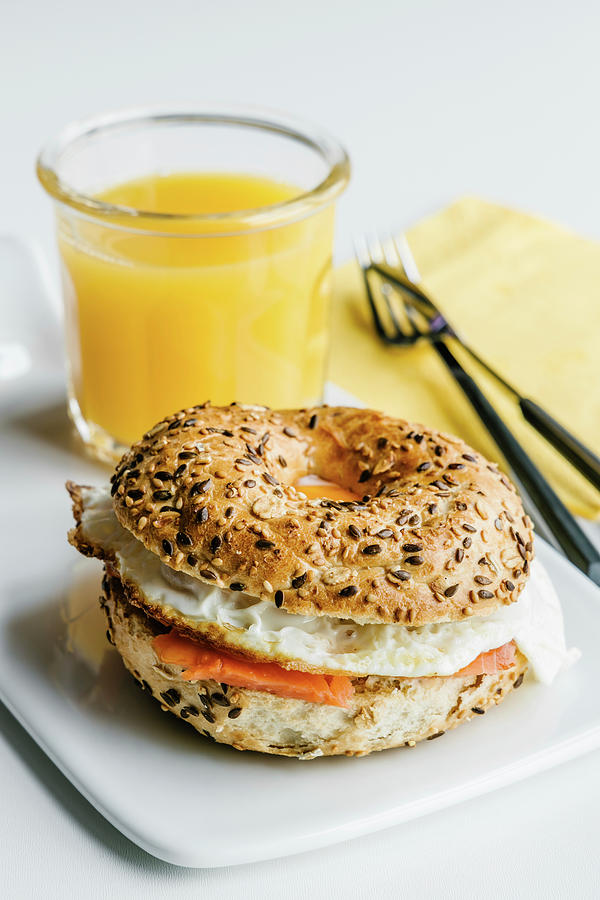 Bagel With Cream Cheese, Salmon And Egg Photograph by Alla Machutt