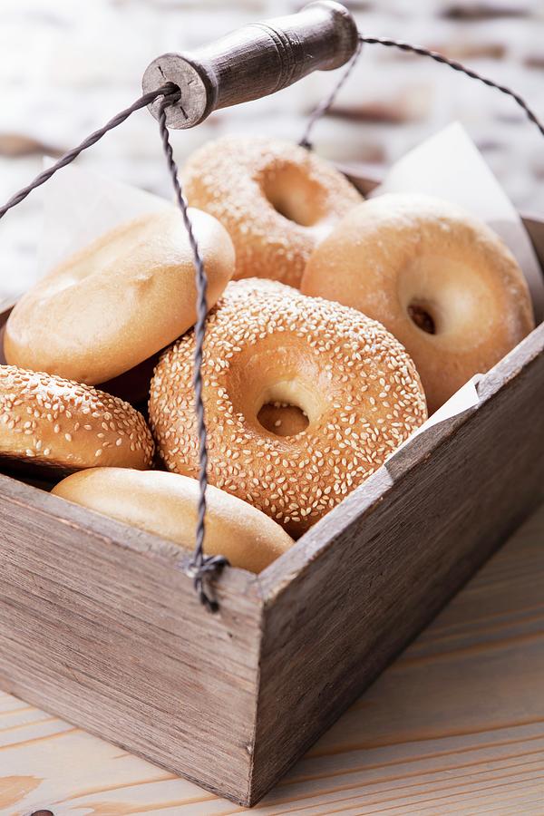 Bread Photograph - Bagels In A Wooden Crate With A Carrying Handle by Younes Stiller