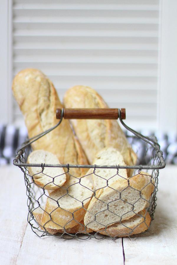 Baguettes In A Wire Basket Photograph by Sylvia E.k Photography