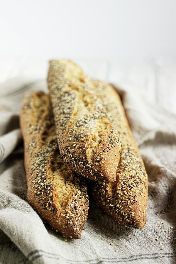 Baguettes With Seeds Photograph by Vernica Orti