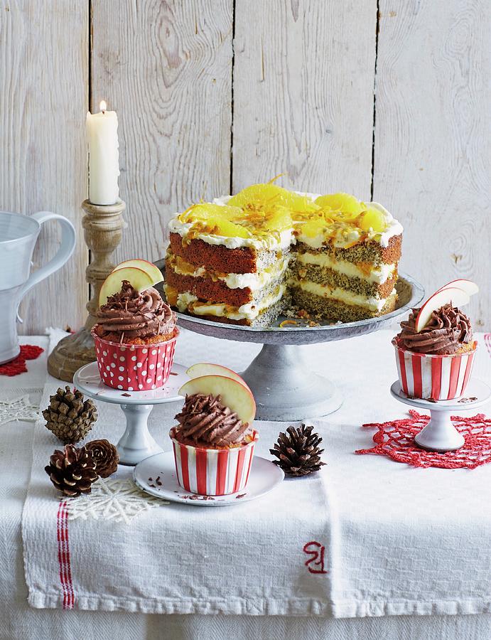 Baked Apple Cupcakes And Orange And Poppyseed Cake, Sliced christmas Photograph by Jalag / Julia Hoersch