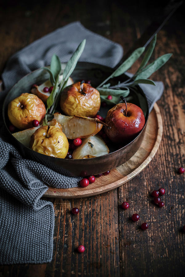 Baked Apples And Baked Pears With Cranberries And Sage Photograph by Justina Ramanauskiene