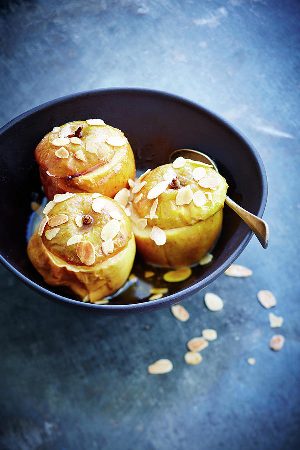Baked Apples With Almonds Photograph by Chivoret