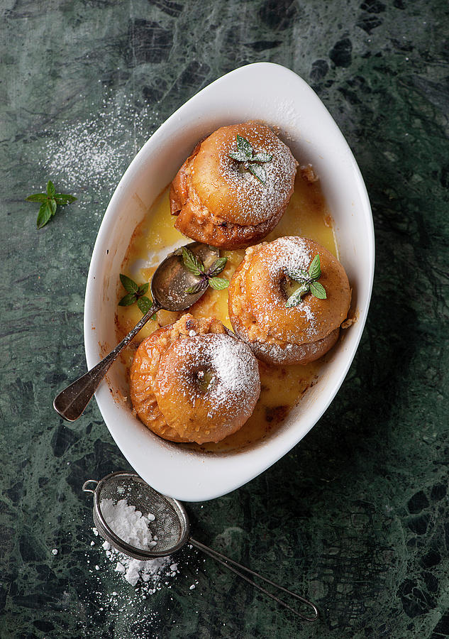 Baked Apples With Icing Sugar Photograph by Ewgenija Schall