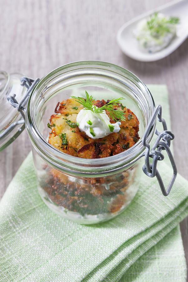 Baked Aubergines With Tzatziki In A Glass Jar Photograph by Younes Stiller