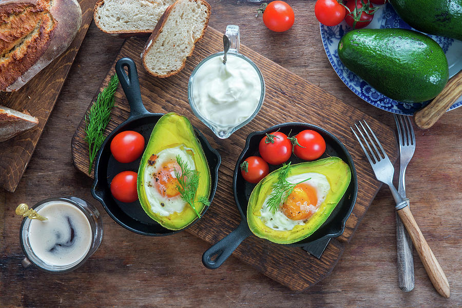 Baked Avocado With Egg Photograph by Irina Meliukh
