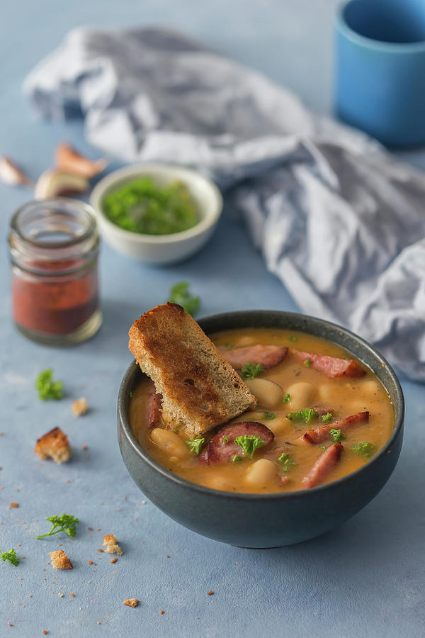 Baked Beans In Sauce With Sausages And Bread Photograph by Malgorzata Laniak