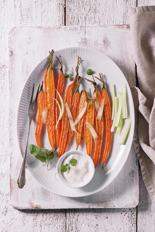 Baked Carrots With Olive Oil, Herbs, Custardery And Yoghurt Photograph by Valeria Aksakova