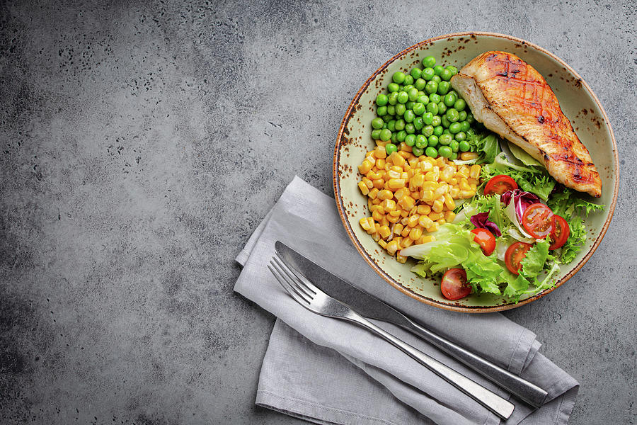 Baked Chicken Breast With Fresh Salad, Green Peas And Corn Photograph by Olena Yeromenko