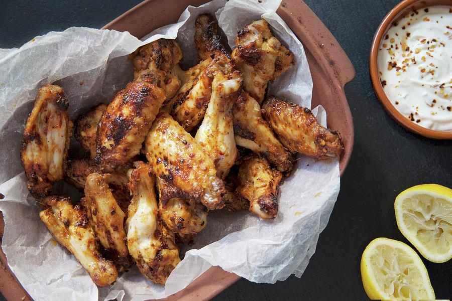 Baked Chicken Wings With Lemon And A Dip Photograph by Andr Ainsworth
