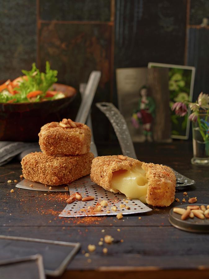 Baked Creamy Cheese In A Schttelbrot Crust crispy Unleavened Bread From South Tyrol With Pine Nuts Photograph by Jan-peter Westermann