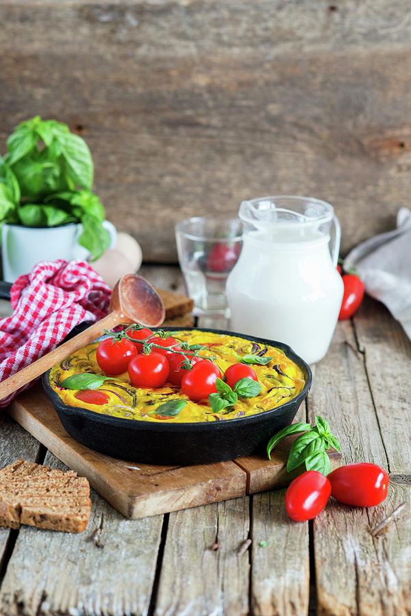 Baked Eggs With Cherry Tomatoes Photograph by Irina Meliukh