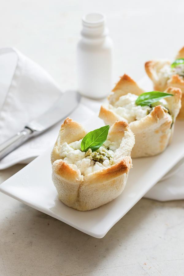 Baked Eggs With Spinach And Feta Cheese Wrapped In Toast Photograph by Andrew Young