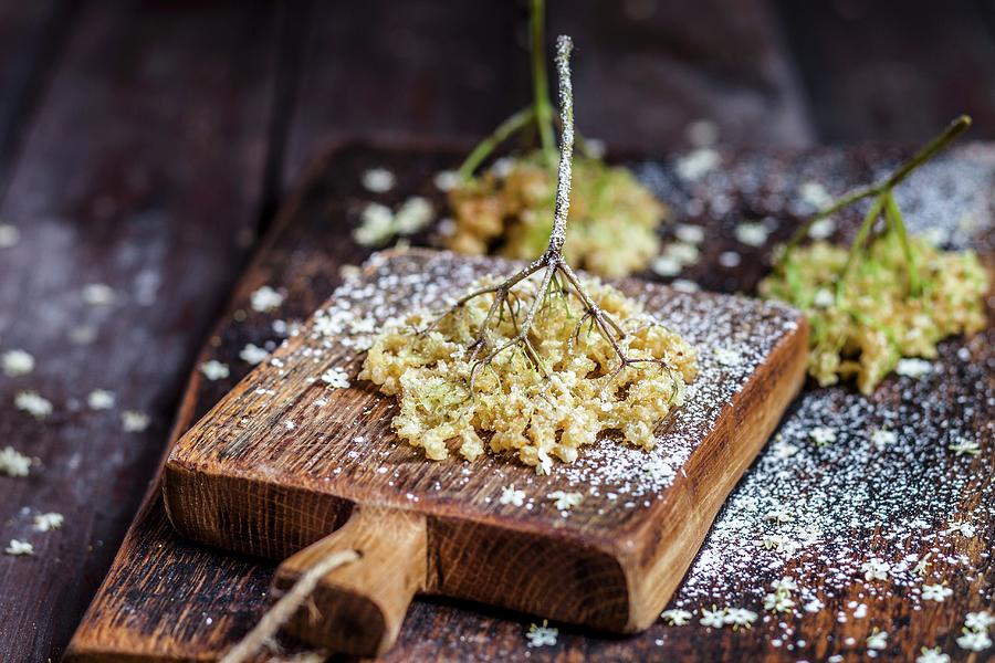 Baked Elderflowers Dusted With Icing Sugar Photograph by Susan Brooks-dammann
