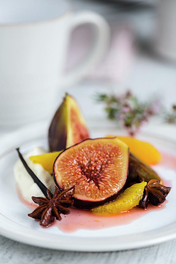 Baked Figs And Oranges In Agave Syrup Photograph by Winfried Heinze
