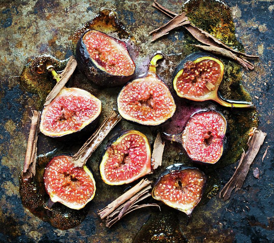 Baked Figs With Honey And Cinnamon Sticks Photograph by Cath Lowe