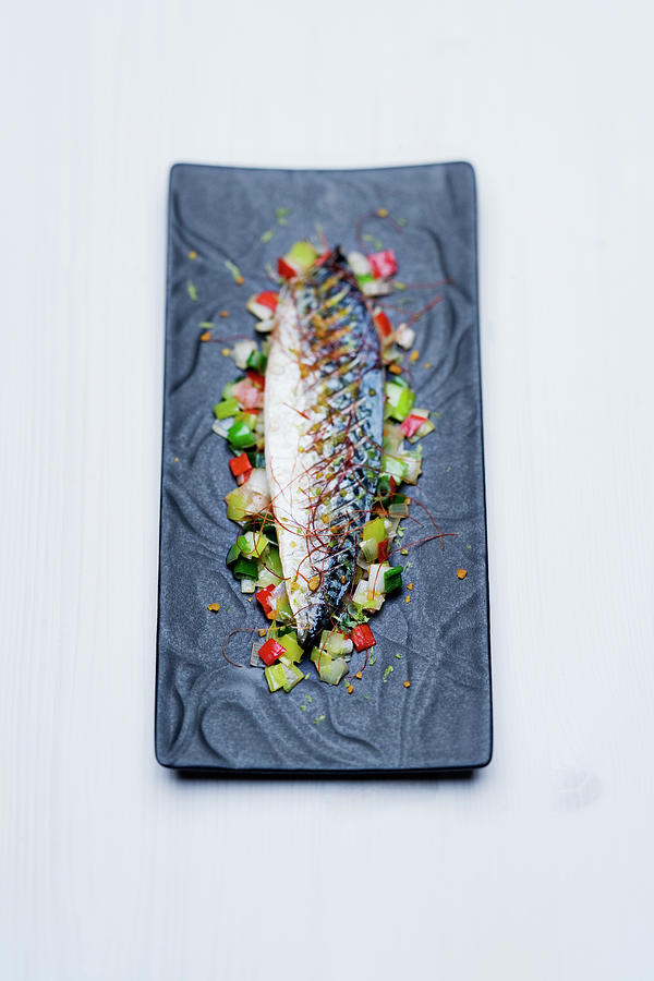 Baked Horse Mackerel With Sea Salt, Pepper, Spring Onions, Leek And Chives Photograph by Michael Wissing