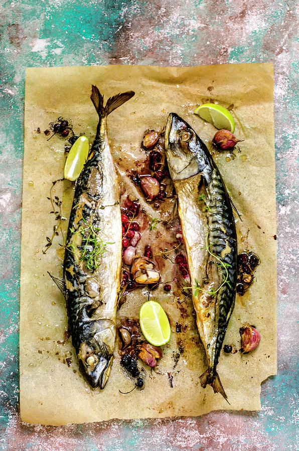 Baked Mackerel Fish With Herbs And Lemon On A Colorful Surface Photograph by Gorobina