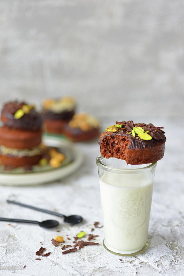 Baked Muffins With Chocolate And Pistachios A Glass Of Milk Photograph by Karolina Smyk